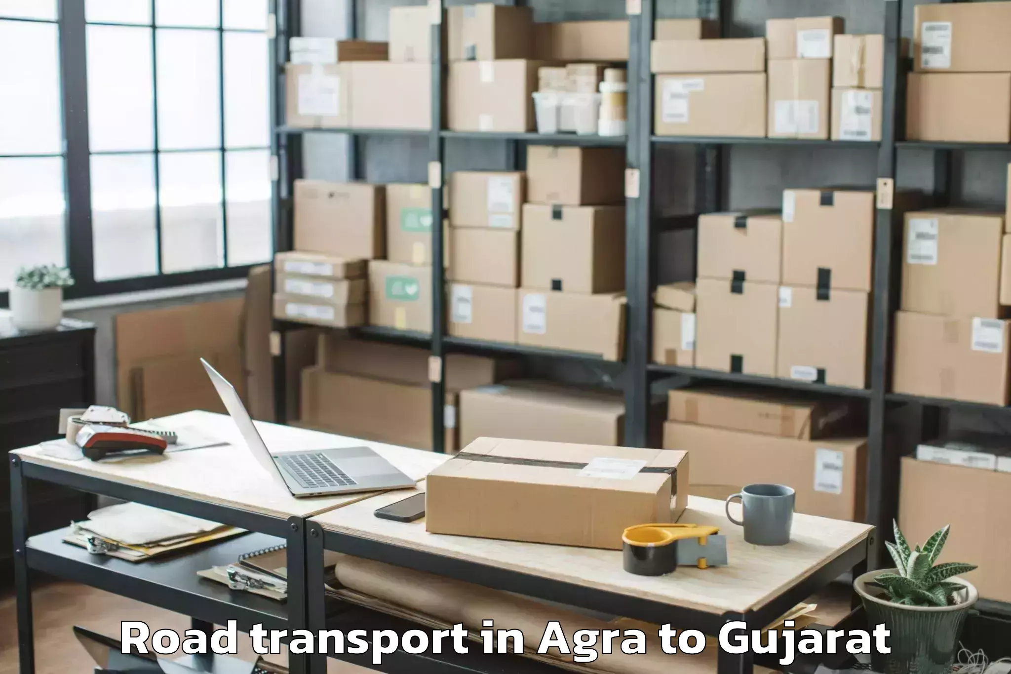 Book Agra to Radhanpur Road Transport Online